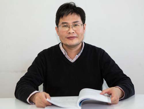 Xinguo Ren